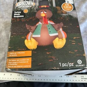 Gemmy Airblown Inflatable Turkey with Lights in Brown, Orange, and Yellow
